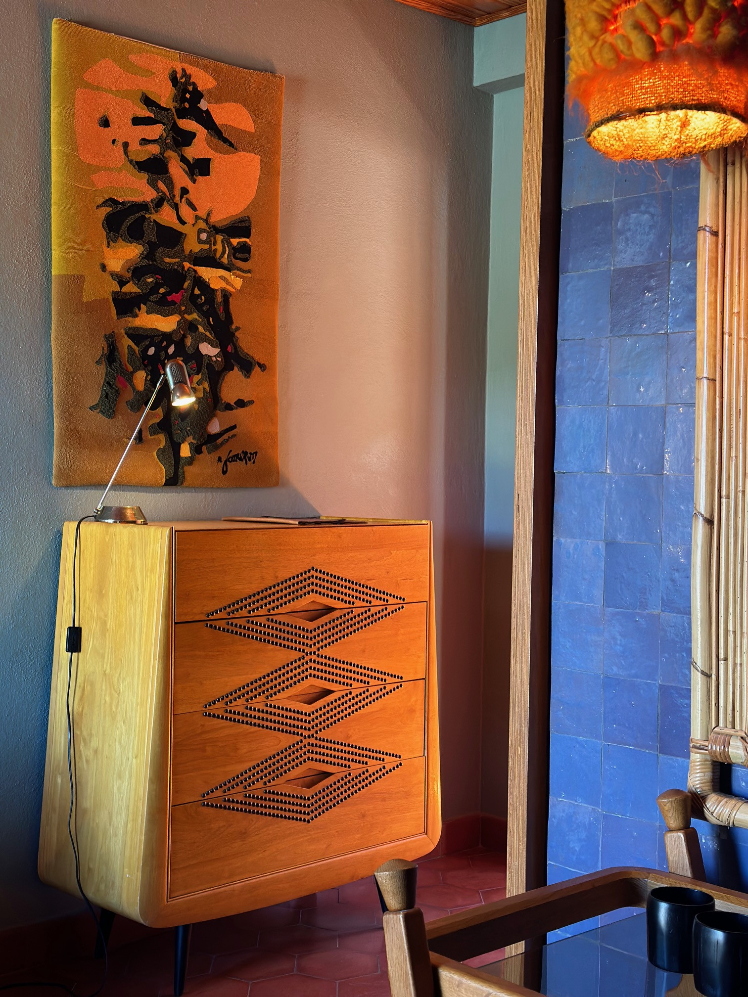 Los Enamorados — vintage cabinet and artworks