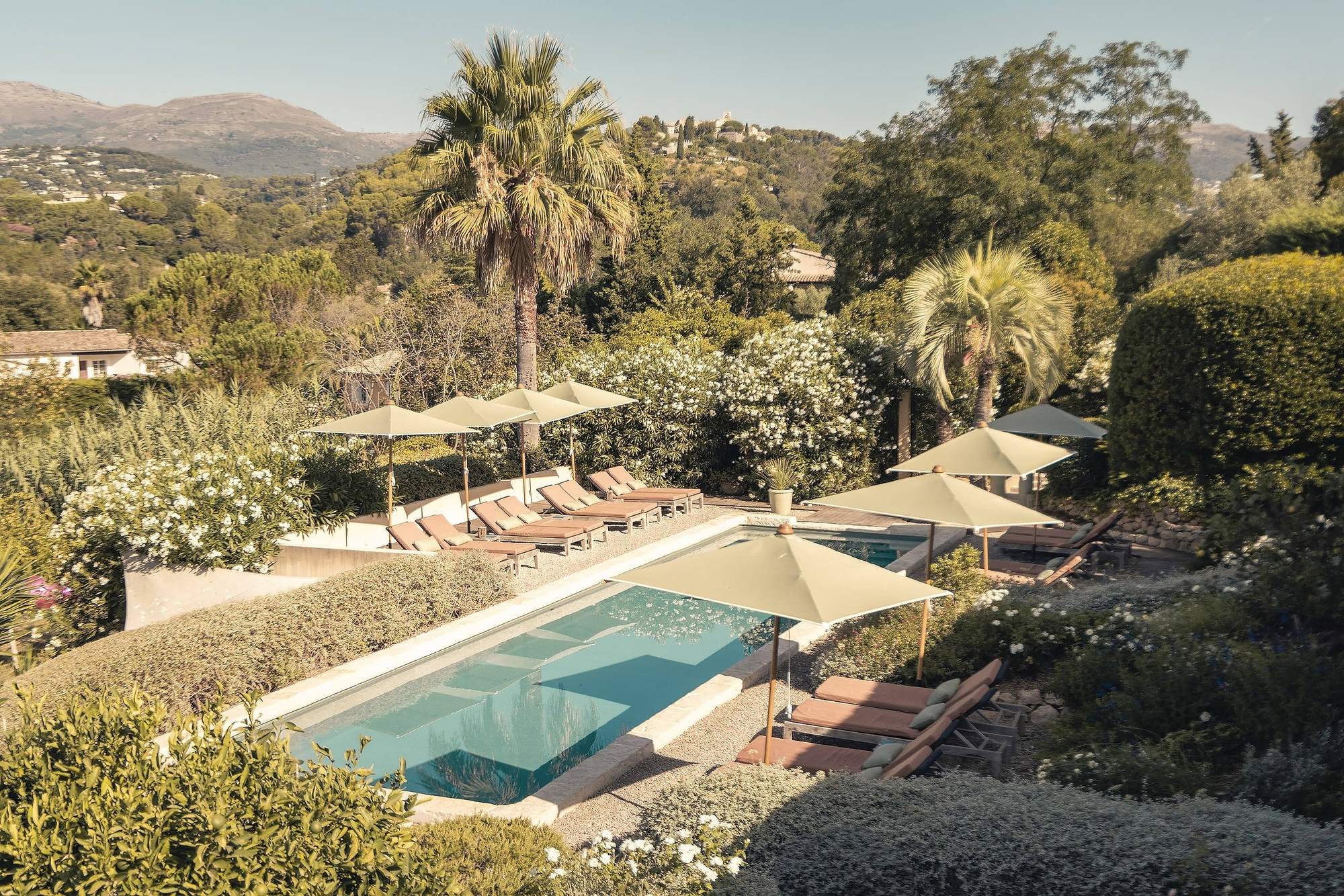 Toile Blanche — the pool among the Mediterranean gardens, with the valley beyond